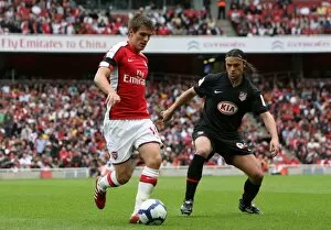 Arsenal v Athletico Madrid 2009-10 Collection: Aaron Ramsey (Arsenal) Tomas Ujfalusi (Atletico)