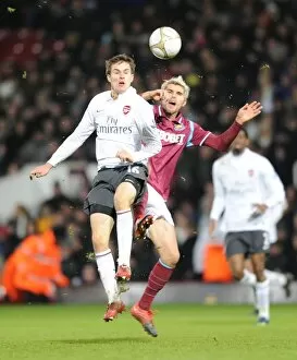 Images Dated 3rd January 2010: Aaron Ramsey (Arsenal) Valon Behrami (West Ham). West Ham United 1: 2 Arsenal