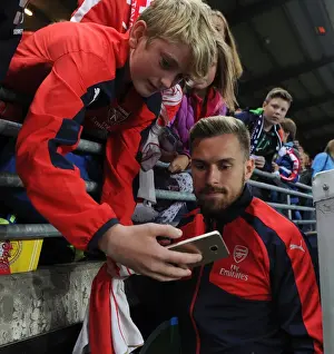 Aaron Ramsey Celebrates with Arsenal Fans after Winning against Viking FK in Norway