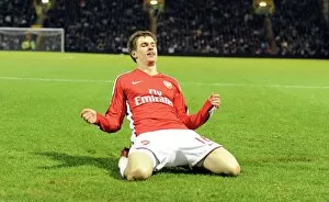 Portsmouth v Arsenal 2009-10 Collection: Aaron Ramsey celebrates scoring the 3rd Arsenal goal. Portsmouth 1: 4 Arsenal