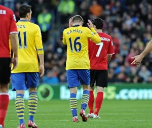 Images Dated 30th November 2013: Aaron Ramsey celebrates scoring Arsenals 1st goal. Cardiff City 0: 3 Arsenal. Barclays