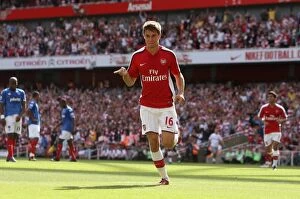 Images Dated 22nd August 2009: Aaron Ramsey celebrates scoring Arsenals 4th goal
