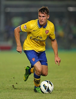 Indonesia Dream Team V Arsenal 2013-14 Prints: Aaron Ramsey Faces Off Against Indonesia All-Stars in 2013