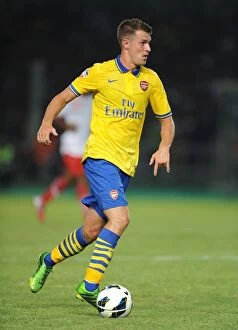 Indonesia Dream Team v Arsenal 2013-14 Collection: Aaron Ramsey Faces Off Against Indonesia All-Stars in 2013 Showdown