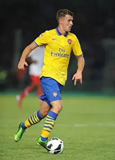 Indonesia Dream Team V Arsenal 2013-14 Prints: Aaron Ramsey Faces Off Against Indonesia All-Stars in 2013 Showdown