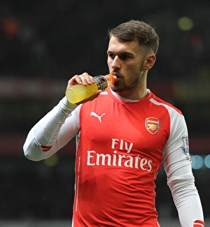 Arsenal V Manchester United 2014-15 Prints: Aaron Ramsey Fueling Up