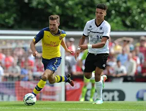 Boreham Wood V Arsenal Prints: Aaron Ramsey Outmaneuvers Lee Angol in Arsenal's Pre-Season Friendly against Borehamwood