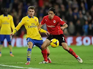 Cardiff City V Arsenal 2013-14 Prints: Aaron Ramsey Outmaneuvers Peter Whittingham: Cardiff City vs