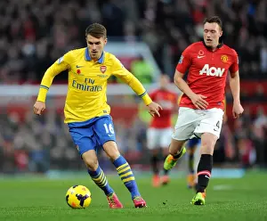 Manchester United V Arsenal 2013-14 Prints: Aaron Ramsey Outmaneuvers Phil Jones: Manchester United vs. Arsenal, Premier League, 2013