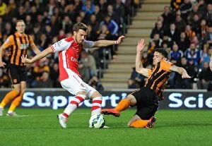 Hull City v Arsenal 2014/15 Gallery: Aaron Ramsey scores Arsenals 2nd goal under pressure from Robbie Brady (Hull)