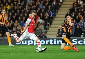 Hull City v Arsenal 2014/15 Gallery: Aaron Ramsey scores Arsenals 2nd goal under pressure from Robbie Brady (Hull)