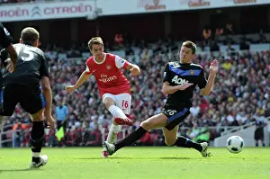 Aaron Ramsey scores Arsenals goal past Michael Carrick (Man Utd). Arsenal 1