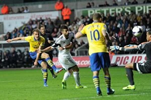 Swansea City v Arsenal 2013-14 Collection: Aaron Ramsey Scores Arsenal's Second Goal Against Swansea City, 2013-14 Premier League