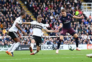 Fulham V Arsenal 2018-19 Prints: Aaron Ramsey Scores Third Goal Against Fulham Amid Pressure from Maxime Le Marchand