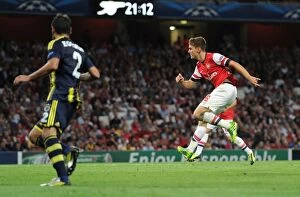 Uefa Champions Laegue Collection: Aaron Ramsey Scores Past Volkan Demirel: Arsenal's Victory in Champions League Play-offs vs