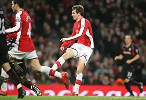 Arsenal V Stoke City 2009-10 Prints: Aaron Ramsey shoots past Stoke goalkeeper Thomas Sorensen to score the 2nd Arsenal goal