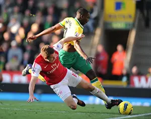 Norwich City V Arsenal 2011-12 Prints: Aaron Ramsey Tackles Leon Barnett: Intense Moment from Norwich City vs. Arsenal (2011-12)