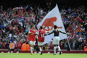 Arsenal V Manchester United 2010-2011 Prints: Aaron Ramsey, Theo Walcott and Emmanuel Eboue (Arsenal) celebrate at the end of the match
