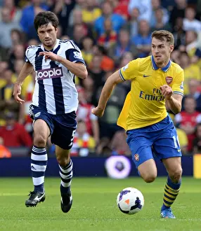 West Bromwich Albion V Arsenal 2013-14 Prints: Aaron Ramsey vs. Claudio Yacob: Intense Battle in West Bromwich Albion vs