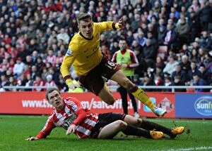Images Dated 9th February 2013: Aaron Ramsey vs. Craig Gardner: Intense Battle in Sunderland v Arsenal Premier League Clash