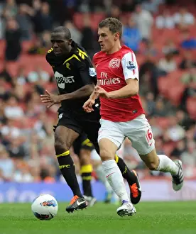 Arsenal V Bolton Wanderers 2011-12 Prints: Aaron Ramsey vs. Fabrice Muamba: Clash at Emirates Stadium