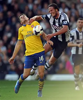 West Bromwich Albion V Arsenal 2013-14 Prints: Aaron Ramsey vs. Jonas Olsson: Clash at The Hawthorns - West Bromwich Albion vs
