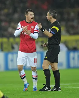 Borussia Dortmund V Arsenal 2013-14 Prints: Aaron Ramsey vs. Marcel Schmelzer: Clash of Champions League Titans (Borussia Dortmund vs)