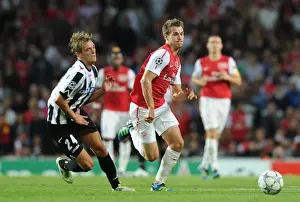 Arsenal V Udinese 2011-12 Prints: Aaron Ramsey vs Medhi Benatia: Clash of the Champions League Titans (2011)