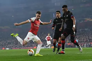 Arsenal V Stade Rennais 2018-19 Prints: Aaron Ramsey vs Mexer: Intense Battle at Emirates Stadium - Arsenal vs Stade Rennais