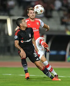 Besiktas V Arsenal 2014-15 Prints: Aaron Ramsey vs. Ramon Motta: Battle in Istanbul - Arsenal vs