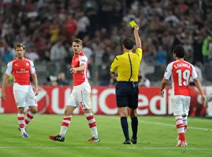 Besiktas V Arsenal 2014-15 Prints: Aaron Ramsey Yellow Carded by Milorad Mazic in Arsenal's UEFA Champions League Clash against Besiktas (2014)