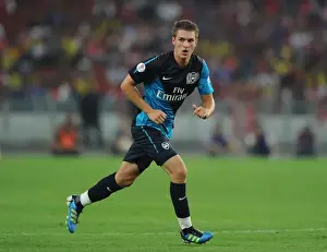 Malaysia XI V Arsenal Prints: Aaron Ramsey's Hat-Trick: Arsenal Crushes Malaysia XI 4-0 at Bukit Jalil Stadium