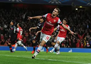 Arsenal V Olympiacos 2012-13 Prints: Aaron Ramsey's Hat-Trick: Arsenal FC Triumphs Over Olympiacos FC in the UEFA Champions League (2012)