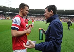 Hull City Collection: Aaron Ramsey's Pre-Match Chat with Arsenal Doctor Gary O'Driscoll (Hull City vs Arsenal, 2014)