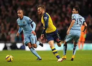 Manchester City V Arsenal 2014-15 Prints: Aaron Ramsey's Sensational Escape: Dodging Jesus Navas and Fernando (Manchester City vs Arsenal)