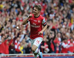 Arsenal V Stoke City 2013-14 Prints: Aaron Ramsey's Thrilling Goal: Arsenal's Victory Against Stoke City