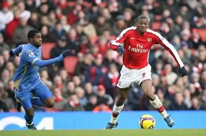 Arsenal v Portsmouth 2008-09 Collection: Abou Diaby (Arsenal) Arnold Mvuemba (Portsmouth)