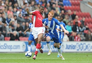 Images Dated 18th April 2010: Abou Diaby (Arsenal) Ben Watson (Wigan). Wigan Athletic 3: 2 Arsenal, FA Barclays Premier League
