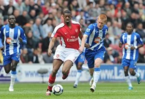 Wigan Athletic v Arsenal 2009-10 Gallery: Abou Diaby (Arsenal) Ben Watson (Wigan). Wigan Athletic 3: 2 Arsenal, FA Barclays Premier League