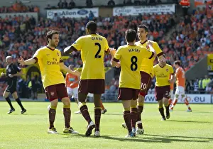 Abou Diaby (Arsenal) celebrates his goal with Cesc Fabregas, Samir Nasri