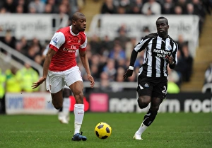 Newcastle United V Arsenal 2010-11 Prints: Abou Diaby (Arsenal) Cheik Tiote (Newcastle). Newcastle United 4: 4 Arsenal