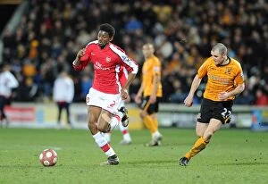 Images Dated 13th March 2010: Abou Diaby (Arsenal) Dean Marney (Hull). Hull City 1: 2 Arsenal, Barclays Premier League