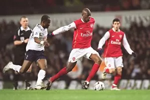 Tottenham Hotspur v Arsenal (Carling Cup) 2006-07 Collection: Abou Diaby (Arsenal) Didier Zakora (Tottenham)