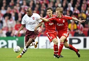 Abou Diaby (Arsenal) Dirk Kuyt (Liverpool)
