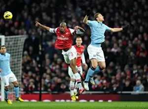 Arsenal v Manchester City 2012-13 Collection: Abou Diaby (Arsenal) Edin Dzeko (Man City). Arsenal 0: 2 Manchester City. Barclays Premier League