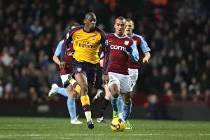 Images Dated 26th December 2008: Abou Diaby (Arsenal) Gabby Agbonlahor (Aston Villa)