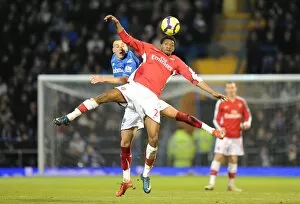 Portsmouth v Arsenal 2009-10 Collection: Abou Diaby (Arsenal) Hassan Yebda (Portsmouth). Portsmouth 1: 4 Arsenal