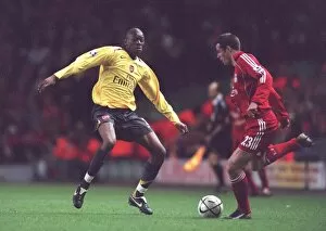Liverpool v Arsenal - Carling Cup Collection: Abou Diaby (Arsenal) Jamie Carragher (Liverpool)
