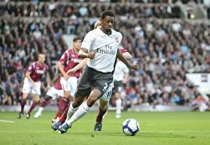 Images Dated 25th October 2009: Abou Diaby (Arsenal) Jonathan Spector (West Ham)