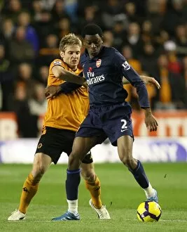 Wolverhampton Wanderers v Arsenal 2009-10 Collection: Abou Diaby (Arsenal) Kevin Doyle (Wolves)